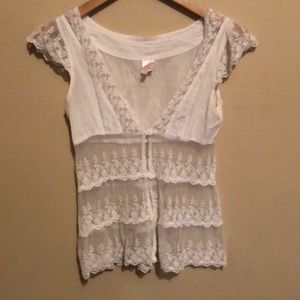 Sheer white lace blouse